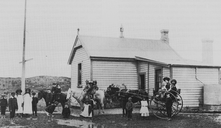 Kahutara School 1905. This is the oldest known photo of the school, with Miss Fellingham on the gig.